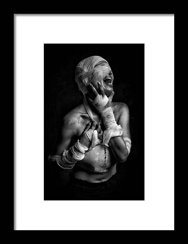 Pain Framed Print featuring the photograph Disturbia #1 by Nilendu Banerjee