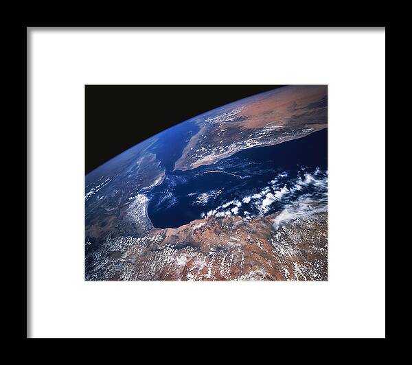 Black Background Framed Print featuring the photograph Earth From Space #1 by Stocktrek