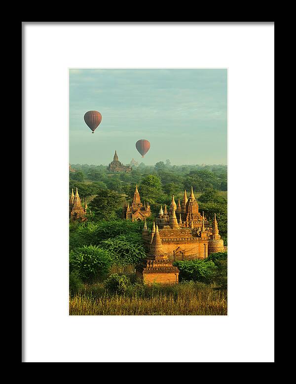 Pagoda Framed Print featuring the photograph Hot Air Balloons Over Bagan In Myanmar #1 by Huang Xin