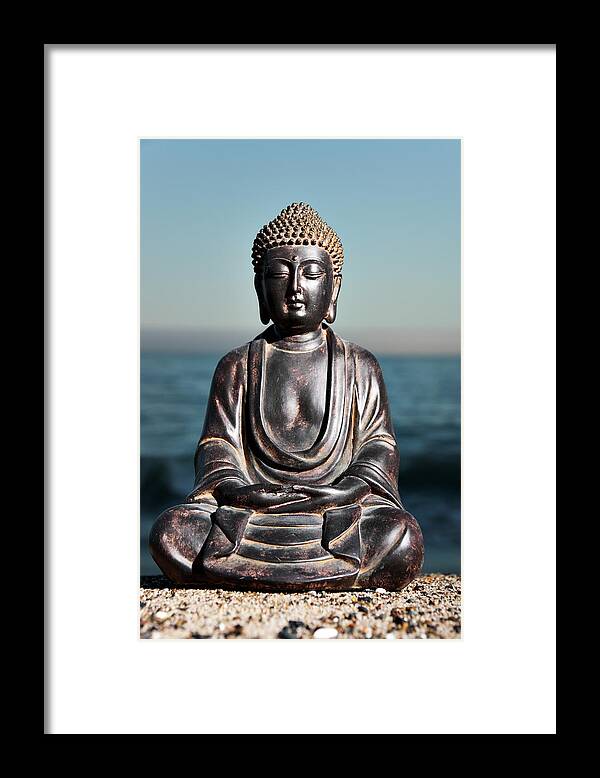 Water's Edge Framed Print featuring the photograph Japanese Buddha Statue At Ocean Shore by Wesvandinter