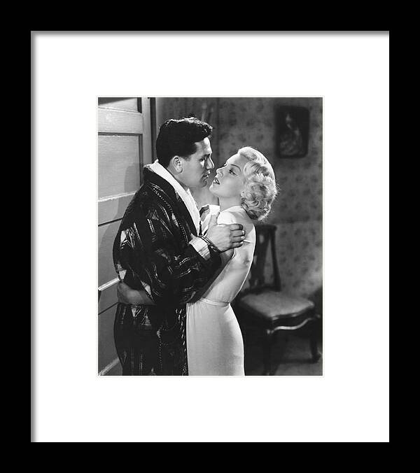 John Garfield Framed Print featuring the photograph LANA TURNER and JOHN GARFIELD in THE POSTMAN ALWAYS RINGS TWICE -1946-. #1 by Album