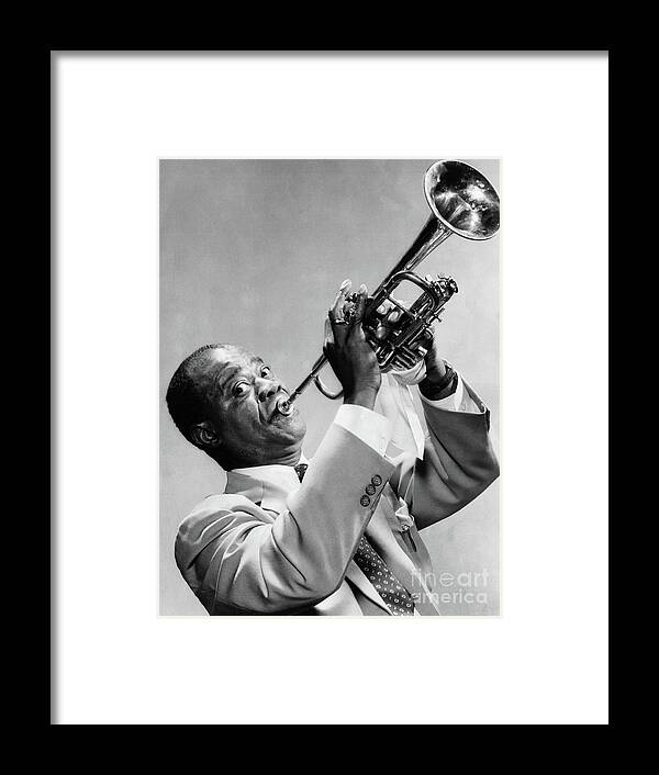People Framed Print featuring the photograph Louis Armstrong Playing The Trumpet #1 by Bettmann
