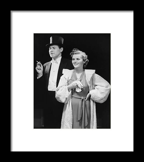 Cool Attitude Framed Print featuring the photograph Portrait Of Couple In Formal Wear #1 by George Marks
