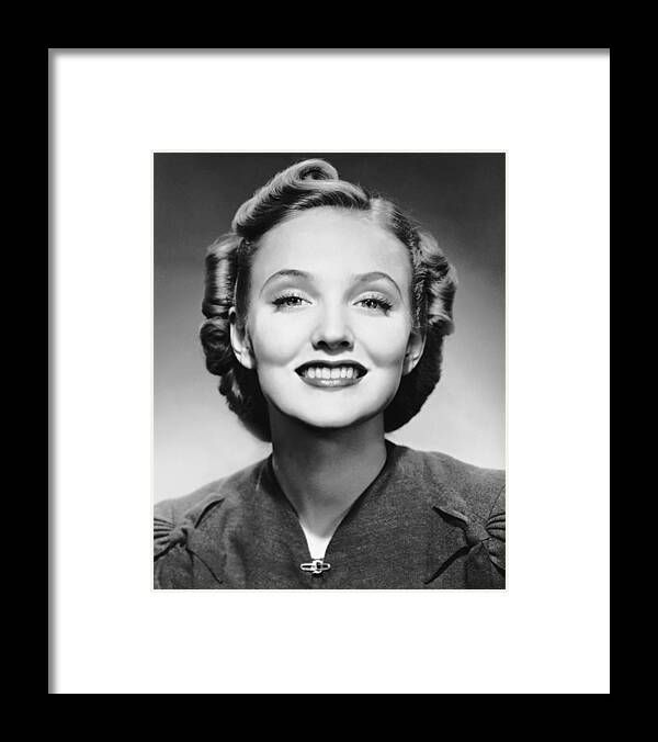 People Framed Print featuring the photograph Portrait Of Smiling Woman #1 by George Marks