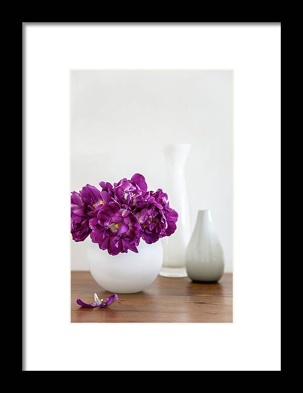 Ip_12596089 Framed Print featuring the photograph 'purple Peony' Tulips In White Spherical Vase #1 by Catja Vedder
