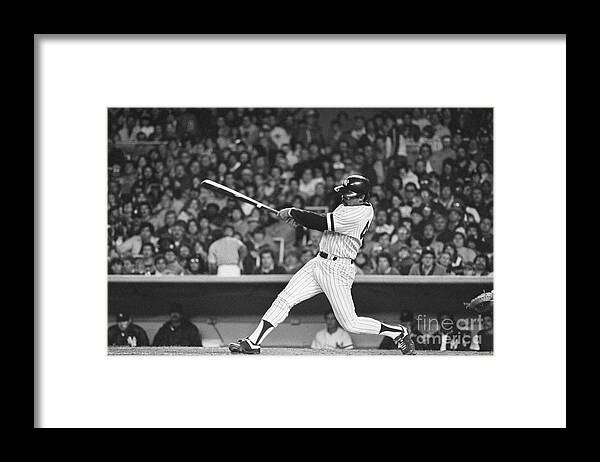 Reggie Jackson - Baseball Player Framed Print featuring the photograph Reggie Jackson Hitting Home Run #1 by Bettmann