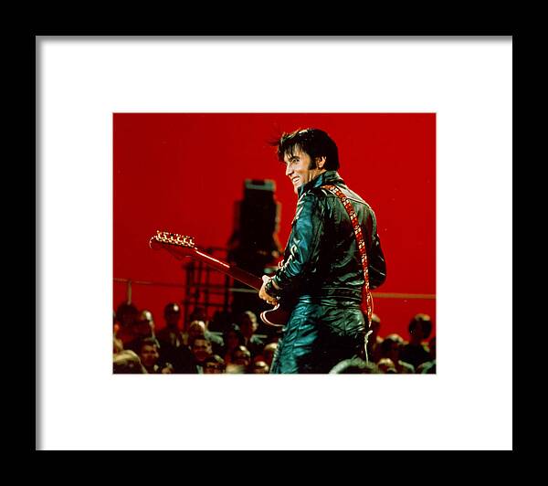 Rock And Roll Framed Print featuring the photograph Rock And Roll Musician Elvis Presley #1 by Michael Ochs Archives
