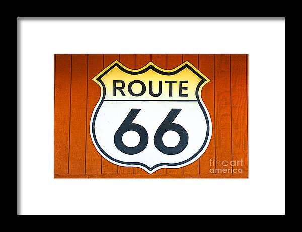 Route 66 Framed Print featuring the photograph Route 66 wooden background #1 by Benny Marty