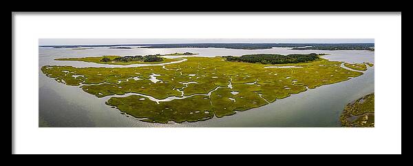 Landscapeaerial Framed Print featuring the photograph Salt Marshes And Estuaries Are Found #1 by Ethan Daniels