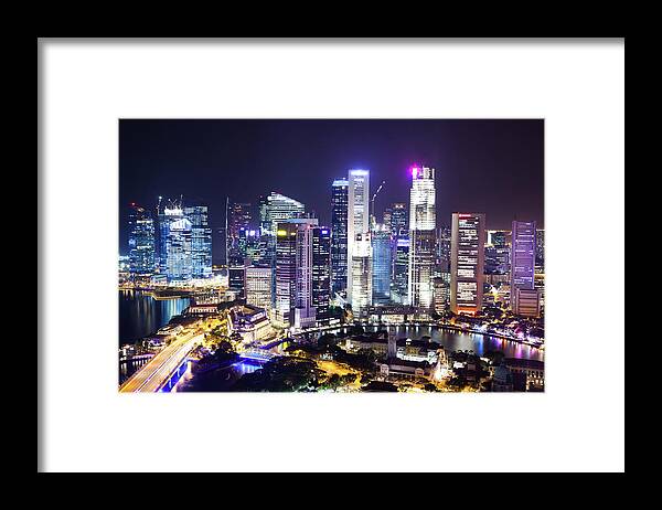 Downtown District Framed Print featuring the photograph Singapore Skyline #1 by Tomml