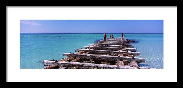Photography Framed Print featuring the photograph Tourist Walking On An Old Pier, Coquina #1 by Panoramic Images