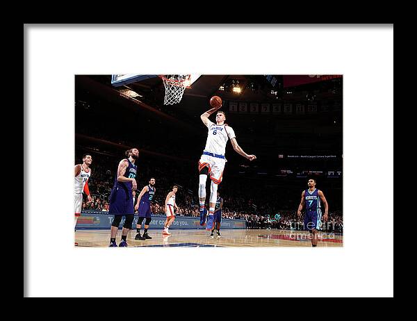 Kristaps Porzingis Framed Print featuring the photograph Charlotte Hornets V New York Knicks by Nathaniel S. Butler