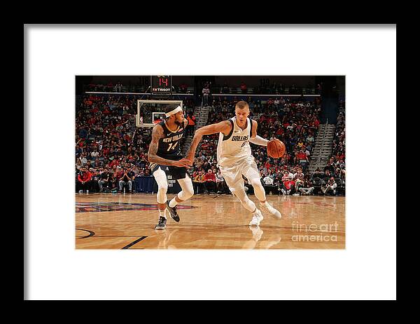 Kristaps Porzingis Framed Print featuring the photograph Dallas Mavericks V New Orleans Pelicans #12 by Layne Murdoch Jr.