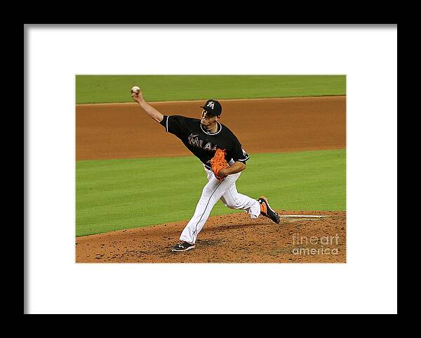 People Framed Print featuring the photograph Washington Nationals V Miami Marlins by Mike Ehrmann