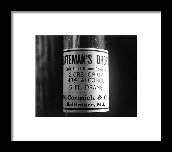Bateman's Drops Framed Print featuring the photograph Antique McCormick and Co Baltimore MD Bateman's Drops Opium Bottle Label - Black and White by Marianna Mills