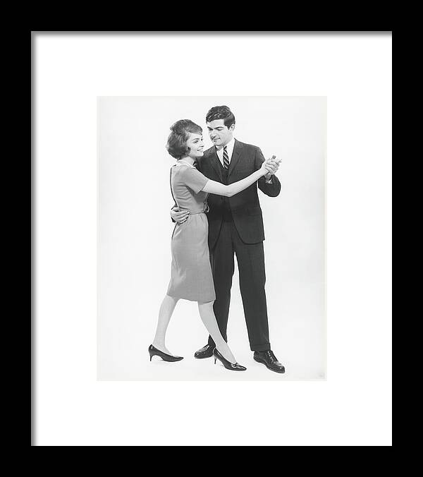 Heterosexual Couple Framed Print featuring the photograph Couple Dancing In Studio, B&w #2 by George Marks