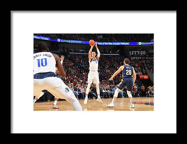 Kristaps Porzingis Framed Print featuring the photograph Dallas Mavericks V New Orleans Pelicans #2 by Jesse D. Garrabrant