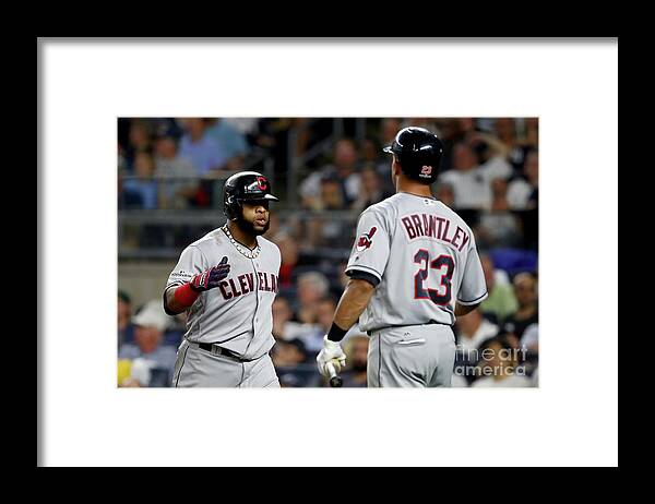 Three Quarter Length Framed Print featuring the photograph Divisional Round - Cleveland Indians V by Al Bello
