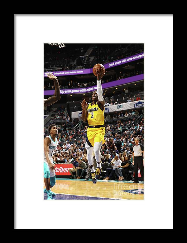 Aaron Holiday Framed Print featuring the photograph Indiana Pacers V Charlotte Hornets by Brock Williams-smith