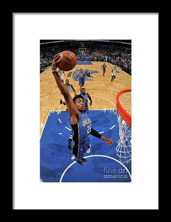 Wesley Iwundu Framed Print featuring the photograph Minnesota Timberwolves V Orlando Magic by Fernando Medina