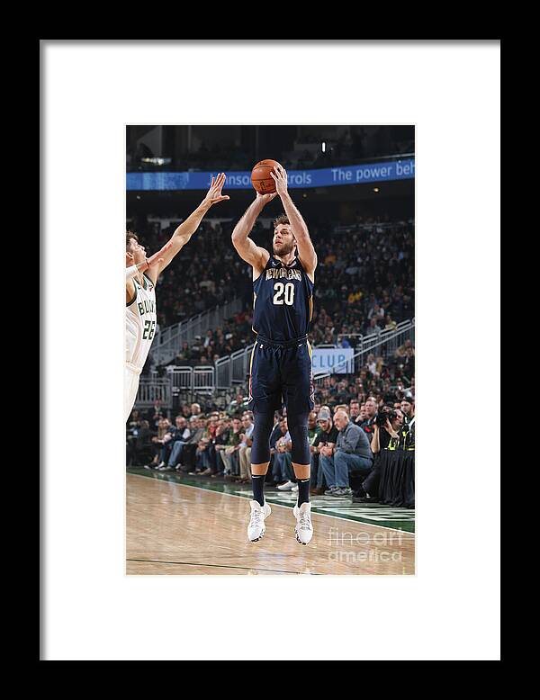 Nicolo Melli Framed Print featuring the photograph New Orleans Pelicans V Milwaukee Bucks by Gary Dineen