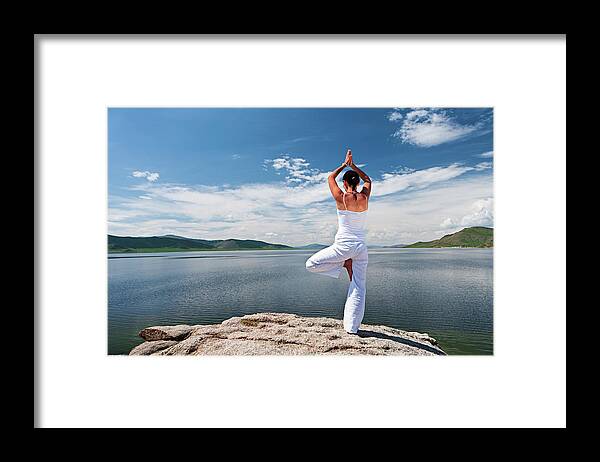 Scenics Framed Print featuring the photograph Young Woman Practicing Yoga #2 by Hadynyah