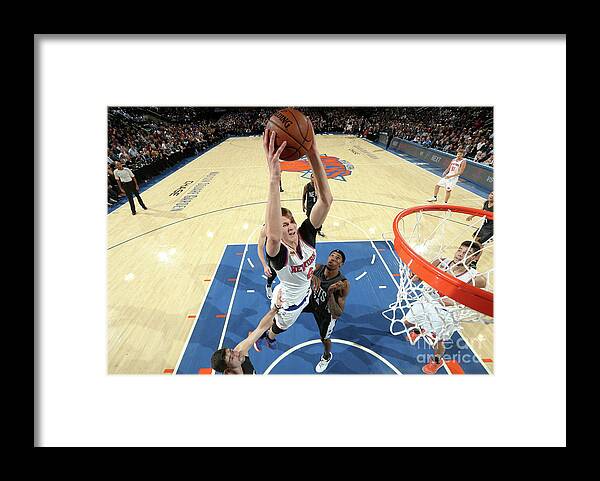 Kristaps Porzingis Framed Print featuring the photograph Brooklyn Nets V New York Knicks #22 by Nathaniel S. Butler