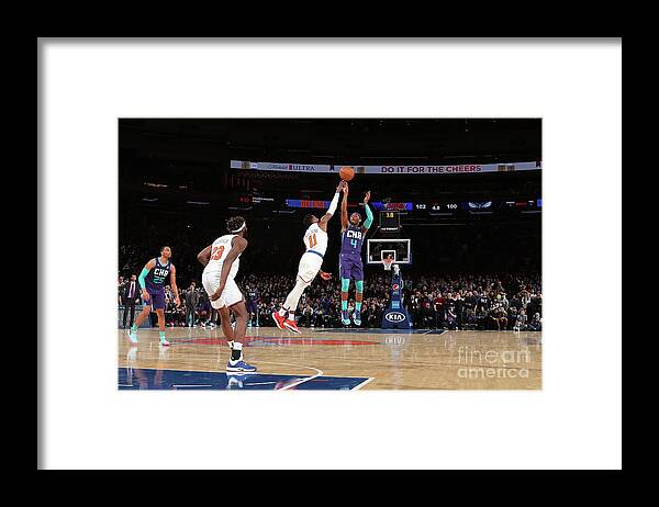 Devonte' Graham Framed Print featuring the photograph Charlotte Hornets V New York Knicks by Nathaniel S. Butler