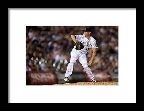Baseball Pitcher Framed Print featuring the photograph Arizona Diamondbacks V Colorado Rockies by Dustin Bradford