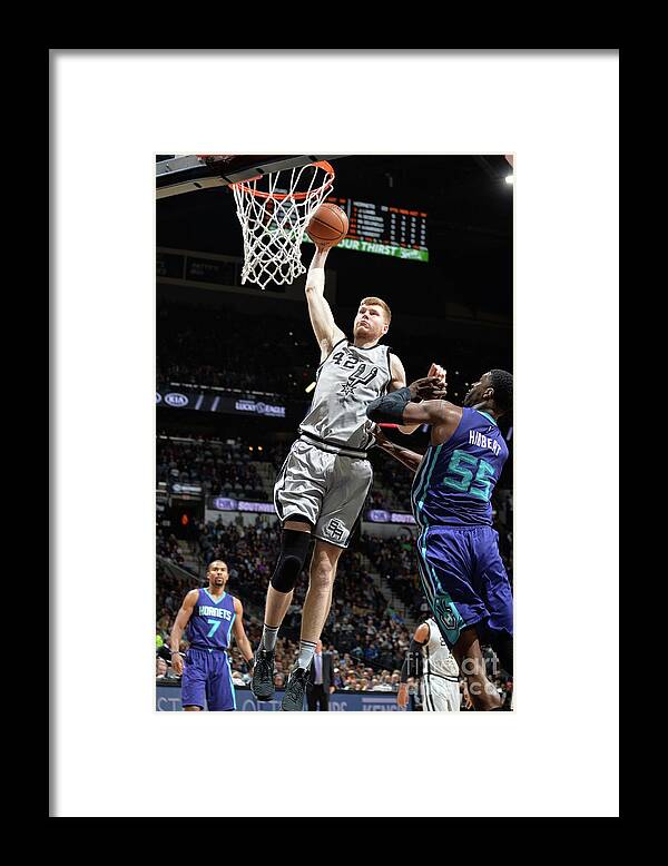 Davis Bertans Framed Print featuring the photograph Charlotte Hornets V San Antonio Spurs by Mark Sobhani