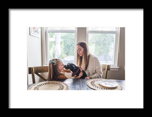Small Dog Framed Print featuring the photograph Multigenerational Family And Small Dog Eating Pancakes For Breakfast #3 by Cavan Images