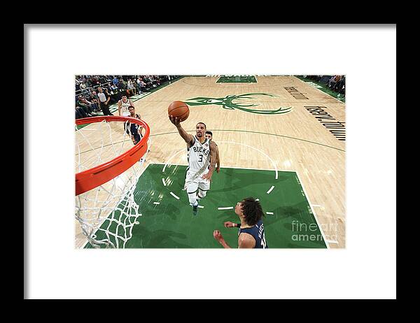 Nba Pro Basketball Framed Print featuring the photograph New Orleans Pelicans V Milwaukee Bucks by Gary Dineen