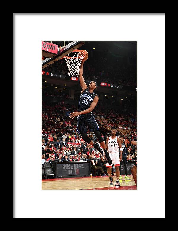 Melvin Frazier Jr Framed Print featuring the photograph Orlando Magic V Toronto Raptors - Game by Ron Turenne