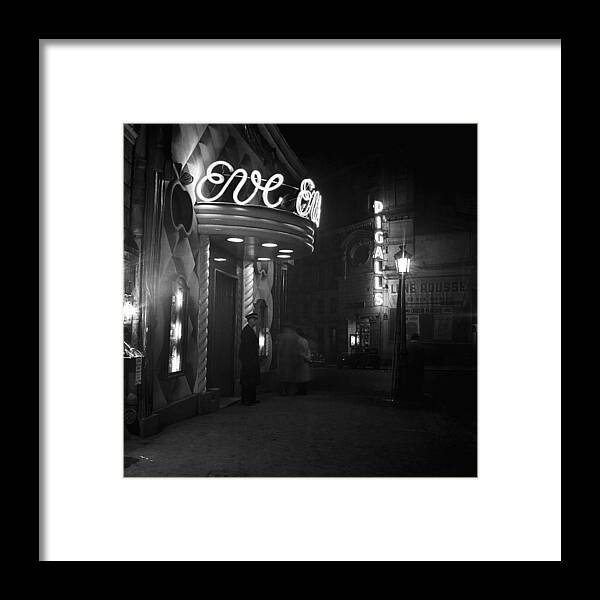 Headwear Framed Print featuring the photograph Paris At Night #3 by Michael Ochs Archives