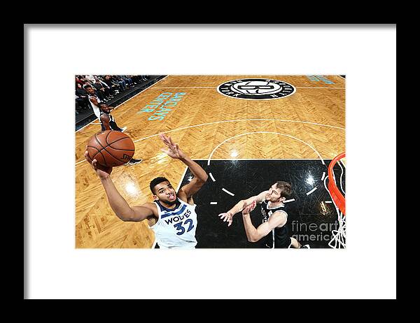Karl-anthony Towns Framed Print featuring the photograph Minnesota Timberwolves V Brooklyn Nets by Nathaniel S. Butler