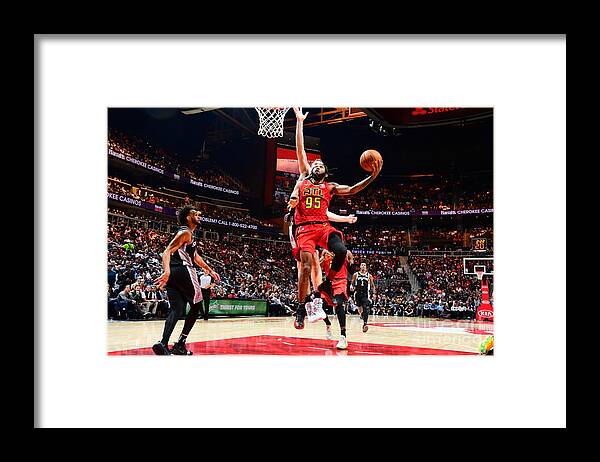 Deandre' Bembry Framed Print featuring the photograph San Antonio Spurs V Atlanta Hawks by Scott Cunningham