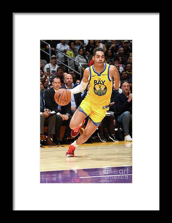 Jordan Poole Framed Print featuring the photograph Golden State Warriors V Los Angeles by Andrew D. Bernstein