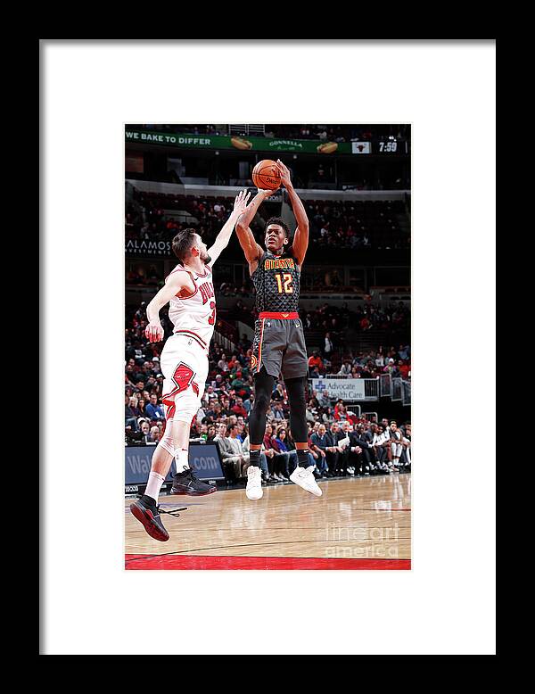 De'andre Hunter Framed Print featuring the photograph Atlanta Hawks V Chicago Bulls by Jeff Haynes