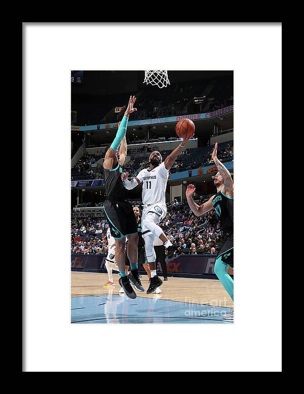 Mike Conley Framed Print featuring the photograph Charlotte Hornets V Memphis Grizzlies by Joe Murphy