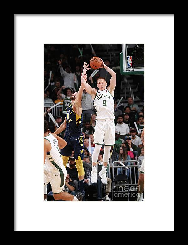 Nba Pro Basketball Framed Print featuring the photograph Indiana Pacers V Milwaukee Bucks by Gary Dineen