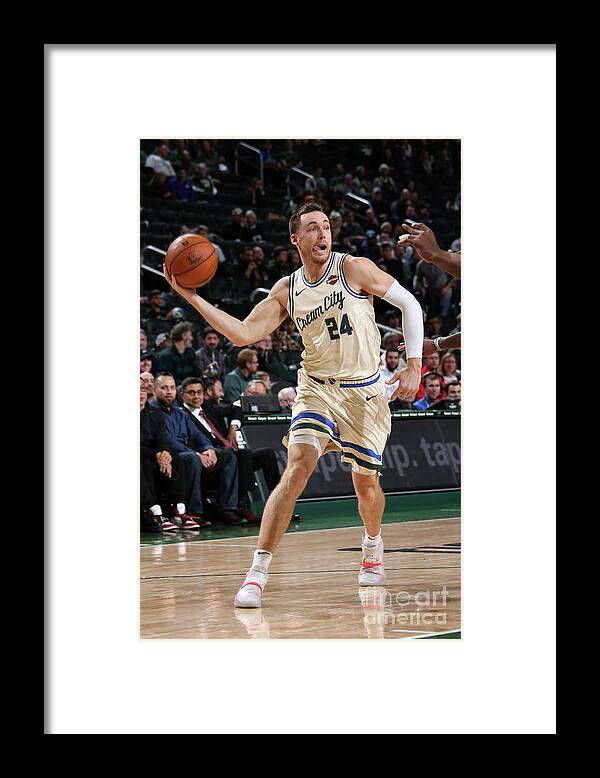 Pat Connaughton Framed Print featuring the photograph New York Knicks V Milwaukee Bucks by Gary Dineen