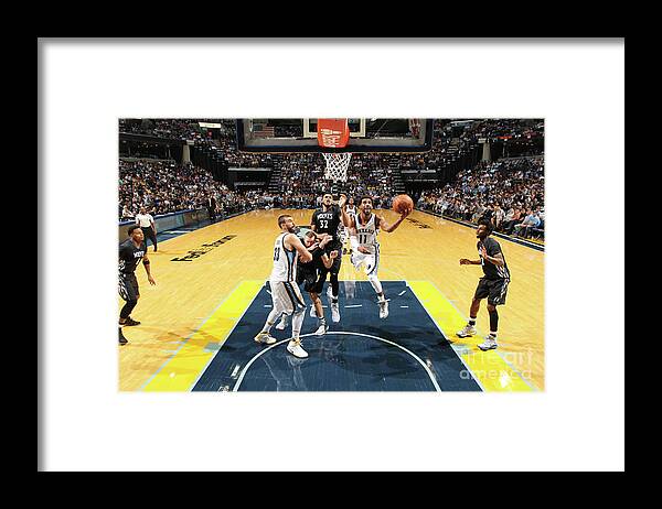 Mike Conley Framed Print featuring the photograph Minnesota Timberwolves V Memphis by Joe Murphy