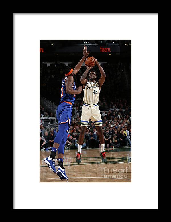 Thanasis Antetokounmpo Framed Print featuring the photograph New York Knicks V Milwaukee Bucks #7 by Gary Dineen