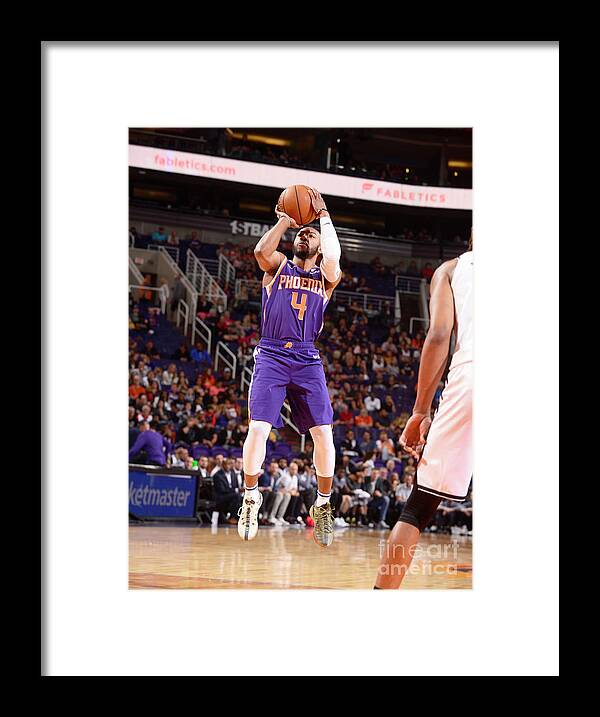 Jevon Carter Framed Print featuring the photograph Brooklyn Nets V Phoenix Suns by Barry Gossage