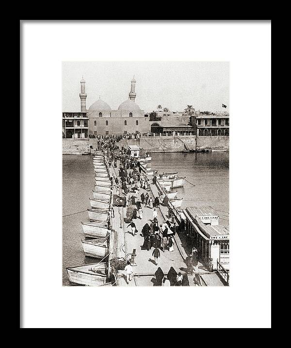 1st Framed Print featuring the photograph A pontoon bridge crossing the River Tigris in Baghdad in 1914 by Ken Welsh