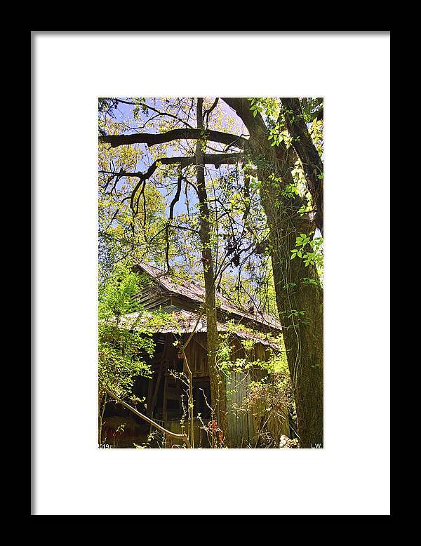 A Barn Among The Trees Vertical Framed Print featuring the photograph A Barn Among The Trees Vertical by Lisa Wooten