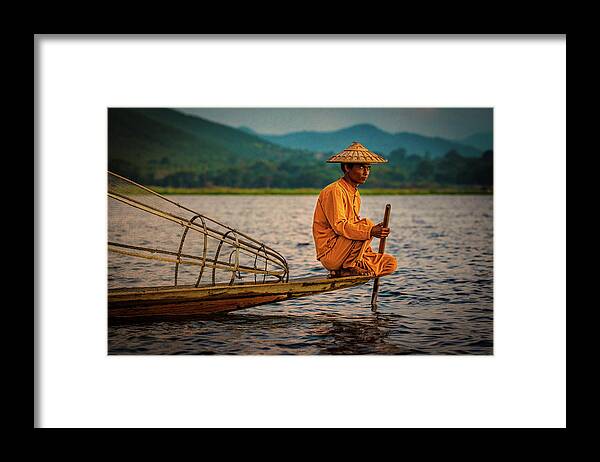 Fisherman Framed Print featuring the photograph A Fisherman Of Inle Lake by Chris Lord