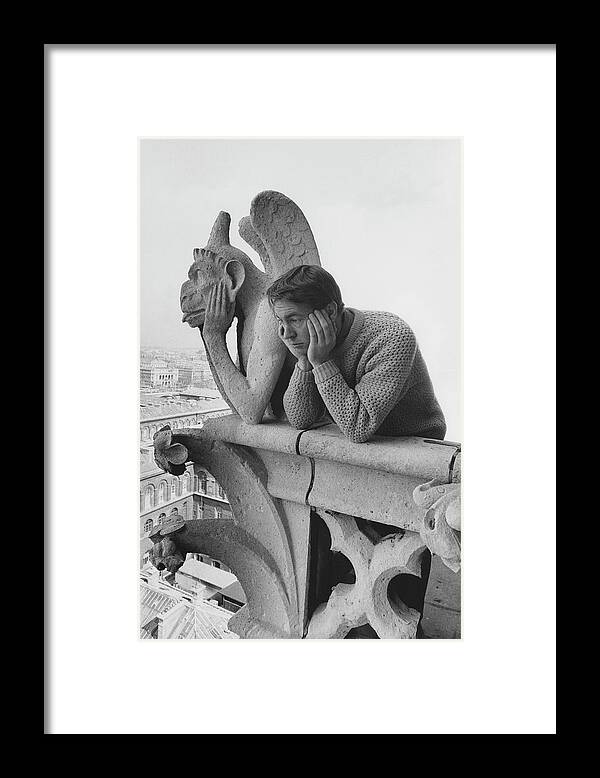 Architecture Framed Print featuring the photograph Model Beside Notre Dame's Gargoyle Le Penseur by Reid Miles
