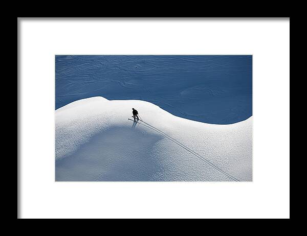 Skiing Framed Print featuring the photograph A Skier In The Alps by Henrik Trygg, Johner