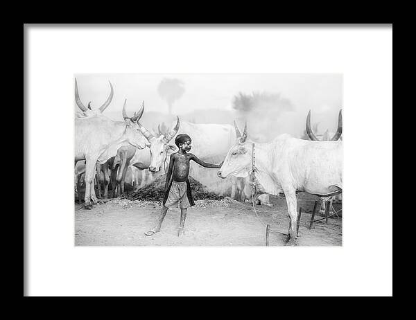 Mundari Framed Print featuring the photograph A Symbiotic Bond by Trevor Cole